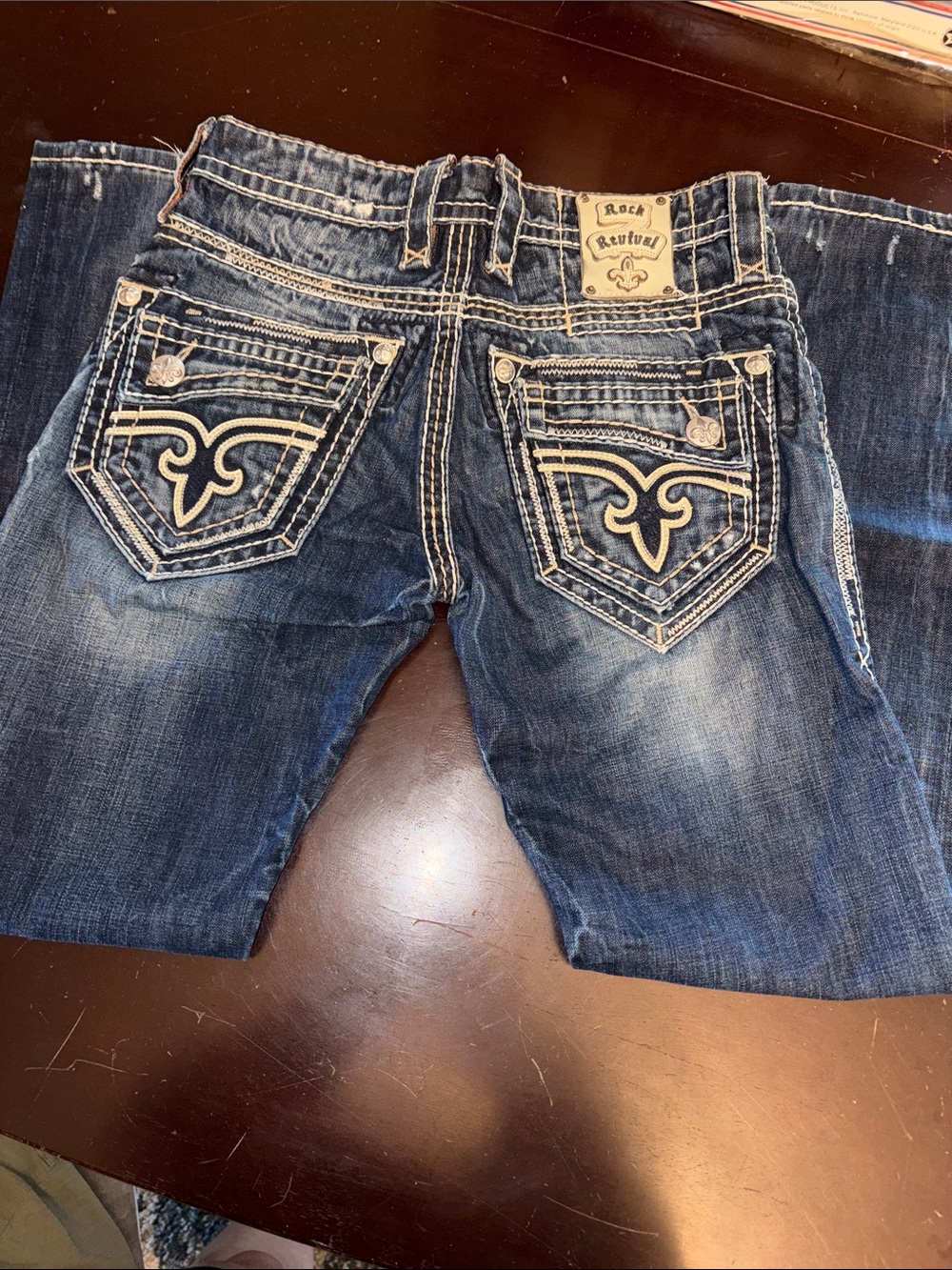 Rock Revival Men's Faded Blue Bootcut Jeans with Embroidered Back Pockets